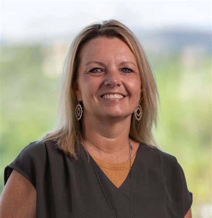 Jennifer Ferguson&nbsp; (pictured) and Rachel Rogers were allegedly let go for trying to stop the thieves and 'breaking employee handbook policy' of not interfering with a robbery